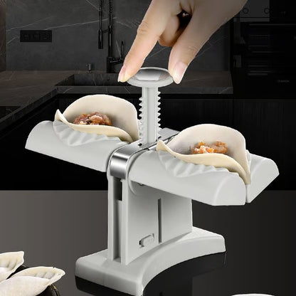 Double Head Dumpling Maker ~ Seal two perfect dumplings in one press.