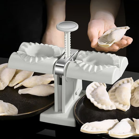 Double Head Dumpling Maker ~ Seal two perfect dumplings in one press.