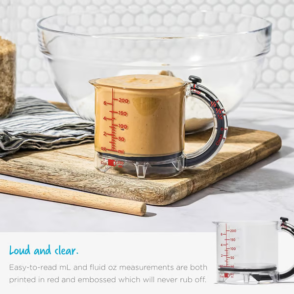 4-in-1 Adjustable Measuring Cup ~ From flour to honey, one cup rules them all.