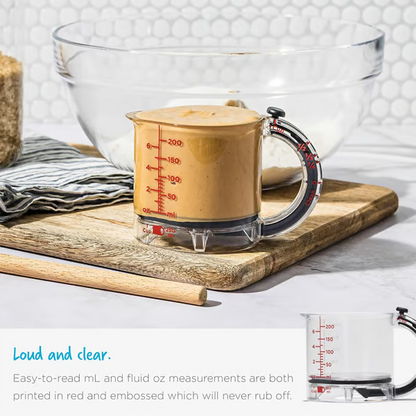 4-in-1 Adjustable Measuring Cup ~ From flour to honey, one cup rules them all.